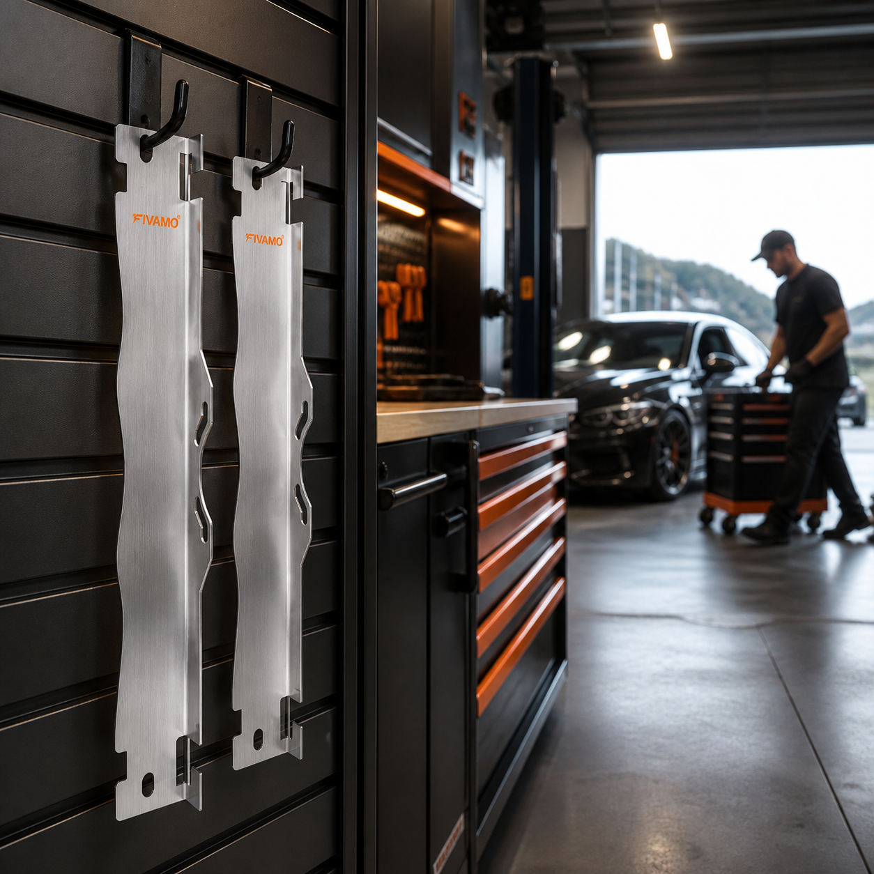 Pair of FIVAMO toe alignment plates hanging in an organised garage